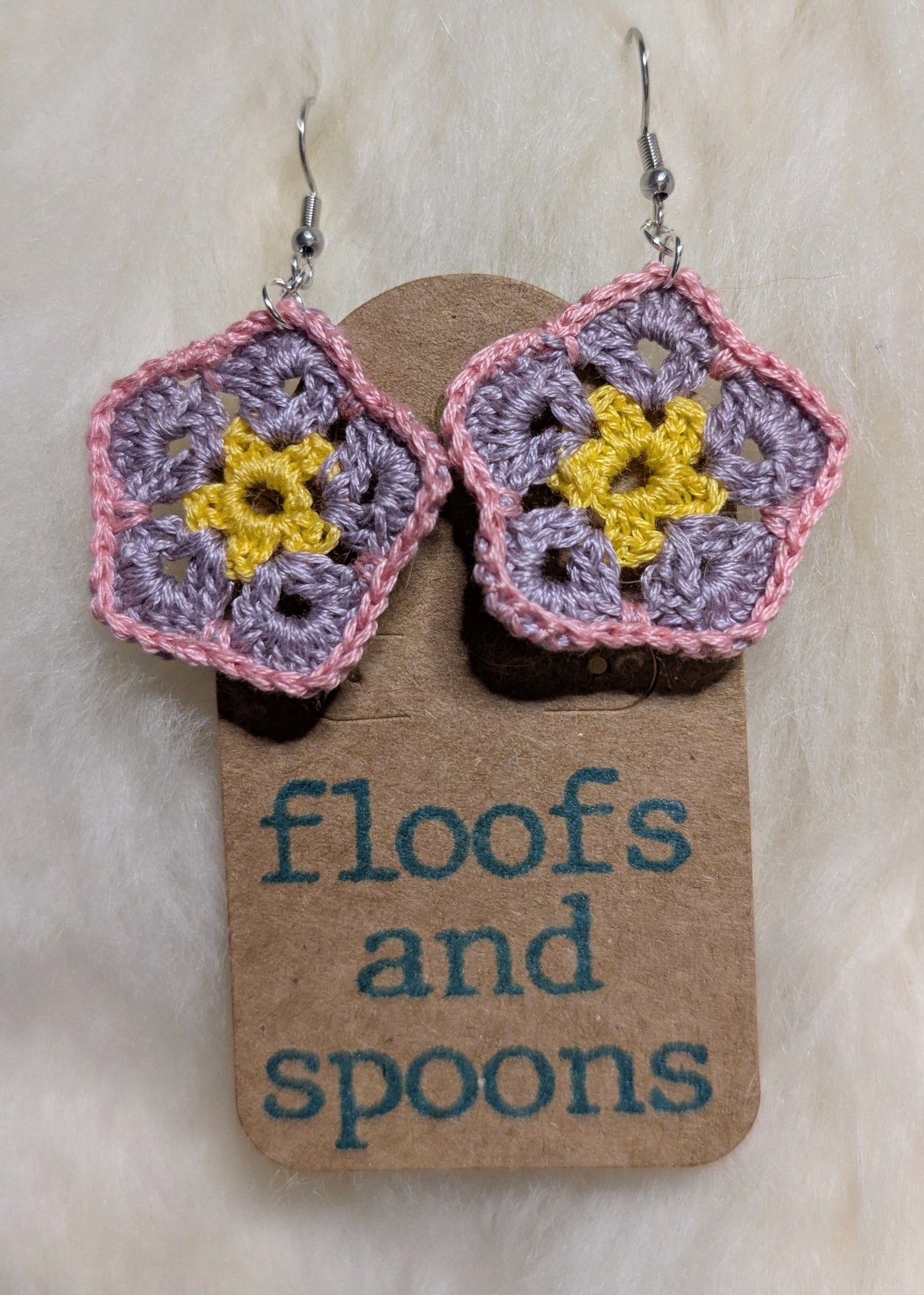 Yellow, lavender, baby pink African violet (s)