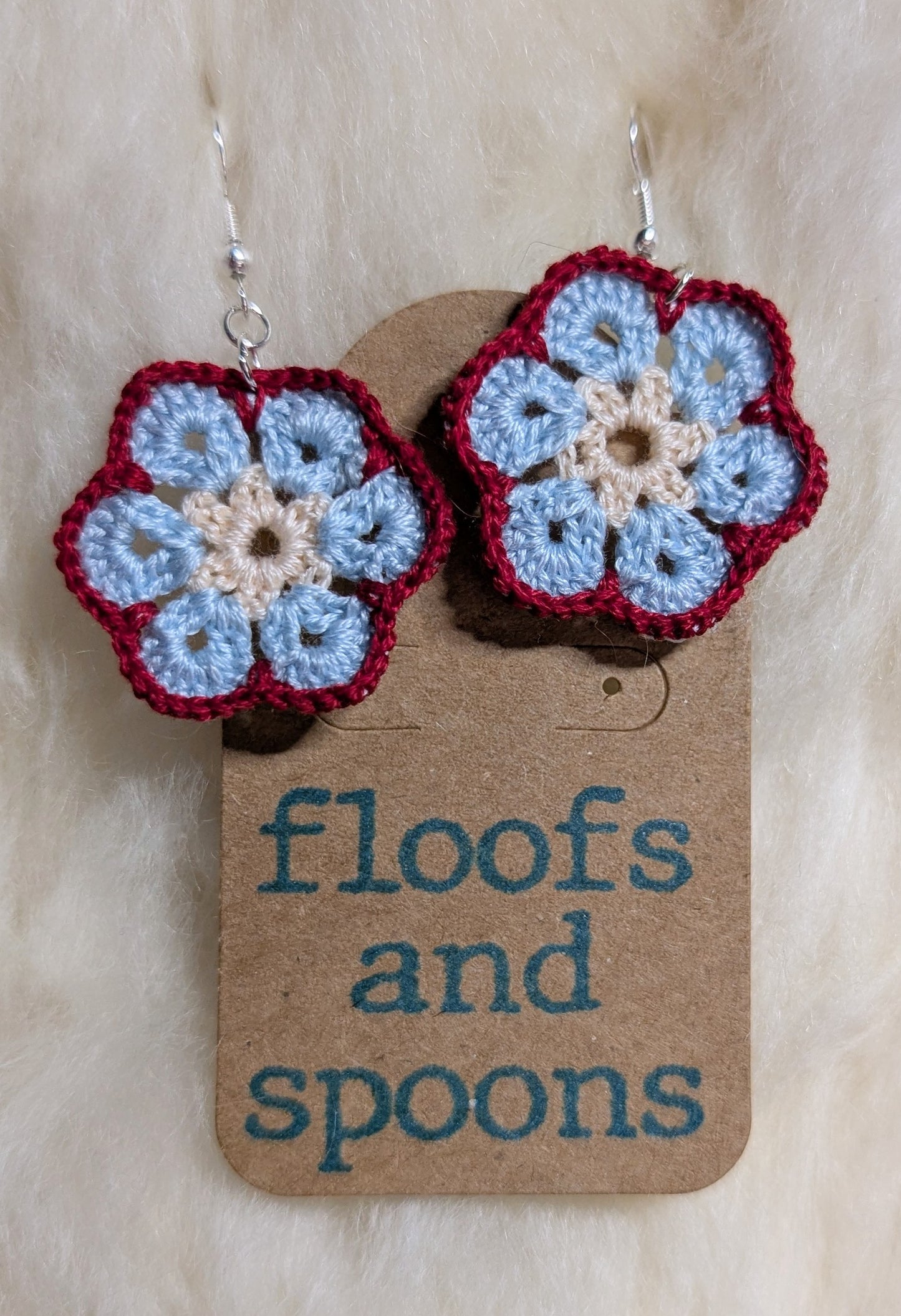 White, light blue, red African violets (s)