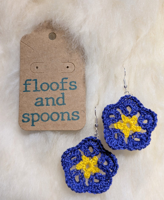 Yellow and dark purple African violets (s)