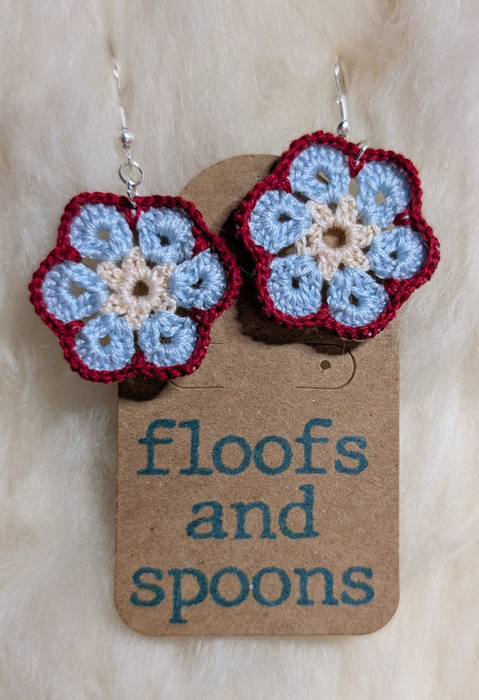 White, light blue, red African violets (s)